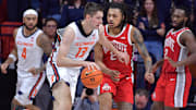 Feb 2, 2025; Champaign, Illinois, USA; Illinois Fighting Illini center Tomislav Ivisic (13) drives the ball against Ohio State Buckeyes forward Devin Royal (21) during the second half at State Farm Center. Mandatory Credit: Ron Johnson-Imagn Images