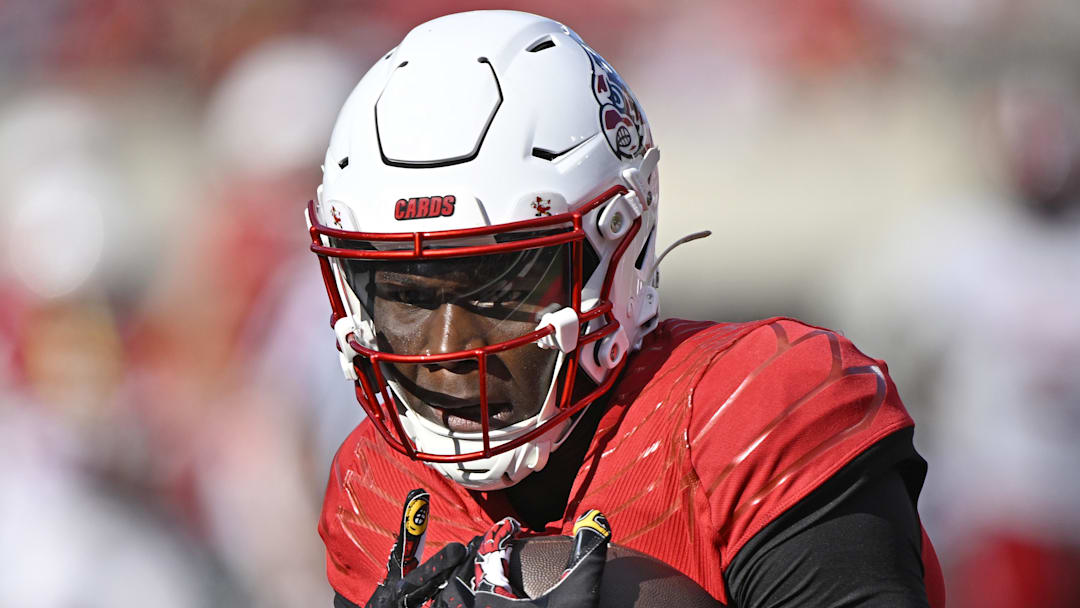 Sep 7, 2024; Louisville, Kentucky, USA;  Louisville Cardinals wide receiver Chris Bell (0) catches a pass against the Jacksonville State Gamecocks during the second half at L&N Federal Credit Union Stadium. Louisville defeated Jacksonville State 49-14. Mandatory Credit: Jamie Rhodes-Imagn Images