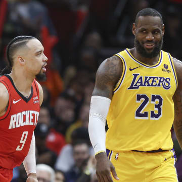 Jan 29, 2024; Houston, Texas, USA; Houston Rockets forward Dillon Brooks (9) reacts toward Los Angeles Lakers forward LeBron James (23) after scoring a basket during the fourth quarter at Toyota Center. Mandatory Credit: Troy Taormina-USA TODAY Sports