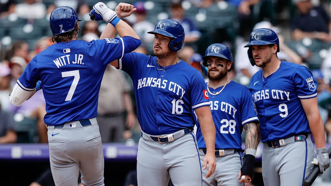 Kansas City Royals shortstop Bobby Witt Jr. (7) celebrates his three-run home run with outfielder Hunter Renfroe (16), center fielder Kyle Isbel (28), and designated hitter Vinnie Pasquantino (9) against the Colorado Rockies at Coors Field.