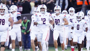 Nov 1, 2025; Boulder, Colorado, USA; Members of the Arizona Wildcats before the game against the Colorado Buffaloes at Folsom Field. Mandatory Credit: Ron Chenoy-Imagn Images