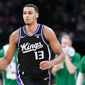 Apr 5, 2024; Boston, Massachusetts, USA; Sacramento Kings forward Keegan Murray (13) dribbles the ball against the Boston Celtics during the second half at TD Garden. Mandatory Credit: Eric Canha-Imagn Images