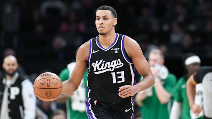 Apr 5, 2024; Boston, Massachusetts, USA; Sacramento Kings forward Keegan Murray (13) dribbles the ball against the Boston Celtics during the second half at TD Garden. Mandatory Credit: Eric Canha-Imagn Images