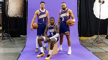 Sep 24, 2025; Phoenix, AZ, USA; Phoenix Suns guard Devin Booker (1), forward Dillon Brooks (3) and guard Jalen Green (4) pose for portrait during Media Day at PHX Arena. Mandatory Credit: Mark J. Rebilas-Imagn Images