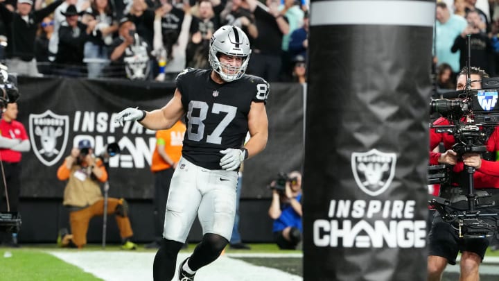 Dec 14, 2023; Paradise, Nevada, USA; Las Vegas Raiders tight end Michael Mayer (87) celebrates after scoring a touchdown in the second quarter against the Los Angeles Chargers at Allegiant Stadium. Mandatory Credit: Stephen R. Sylvanie-USA TODAY Sports