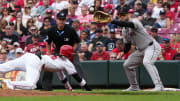 Reds Elly De La Cruz (44) makes it back to first in time during the Reds vs. Diamondbacks game on