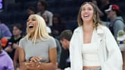 Sep 6, 2025; San Francisco, California, USA;  Minnesota Lynx guard-forward DiJonai Carrington (3) and forward Alanna Smith (8) share a laugh on the sideline before the game against the Golden State Valkyries at Chase Center. Mandatory Credit: David Gonzales-Imagn Images