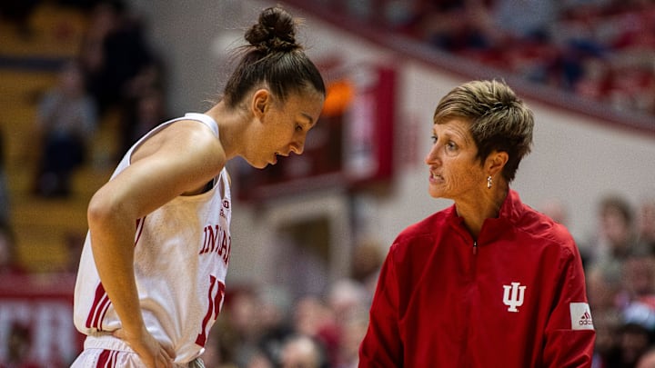 Indiana Head Coach Teri Moren talks with Valentyna Kadlecova (15) during the Indiana versus Oakland women's basketball game at Simon Skjodt Assembly Hall on Sunday, Dec. 22, 2024.