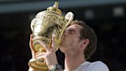A racket Andy Murray used during his 2013 Wimbledon win was sold for $73,000 in auction.