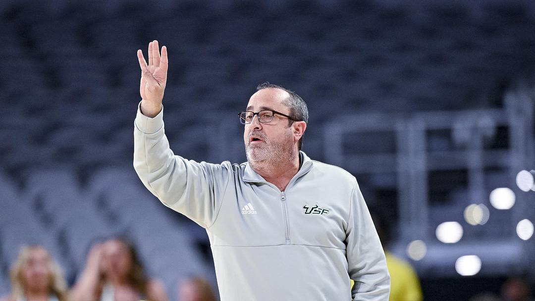 Mar 9, 2022; Fort Worth, TX, USA; South Florida Bulls head coach Jose Fernandez motions to his team during the first half of the American Athletic Conference women's basketball tournament semifinals against the Houston Cougars at Dickies Arena. Mandatory Credit: Jerome Miron-Imagn Images