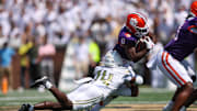 Sep 13, 2025; Atlanta, Georgia, USA; Clemson Tigers wide receiver Tyler Brown (6) is tackled by Georgia Tech Yellow Jackets defensive back Jy Gilmore (14) in the first quarter at Bobby Dodd Stadium at Hyundai Field. Mandatory Credit: Brett Davis-Imagn Images
