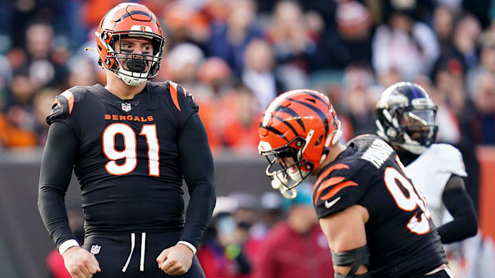 Cincinnati Bengals defensive end Trey Hendrickson, left, and Cincinnati Bengals defensive end Sam Hubbard celebrate a sack in the second quarter during a Week 16 NFL game against the Baltimore Ravens. 