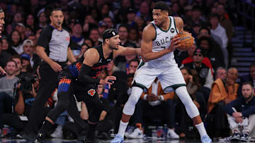 Nov 28, 2025; New York, New York, USA; Milwaukee Bucks forward Giannis Antetokounmpo (34) is guarded by New York Knicks guard Josh Hart (3) during the second half at Madison Square Garden. Mandatory Credit: Vincent Carchietta-Imagn Images