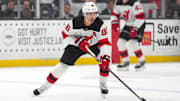 Nov 1, 2025; Los Angeles, California, USA; New Jersey Devils center Jack Hughes (86) skates with the puck against the Los Angeles Kings in the first period at Crypto.com Arena. Mandatory Credit: Kirby Lee-Imagn Images
