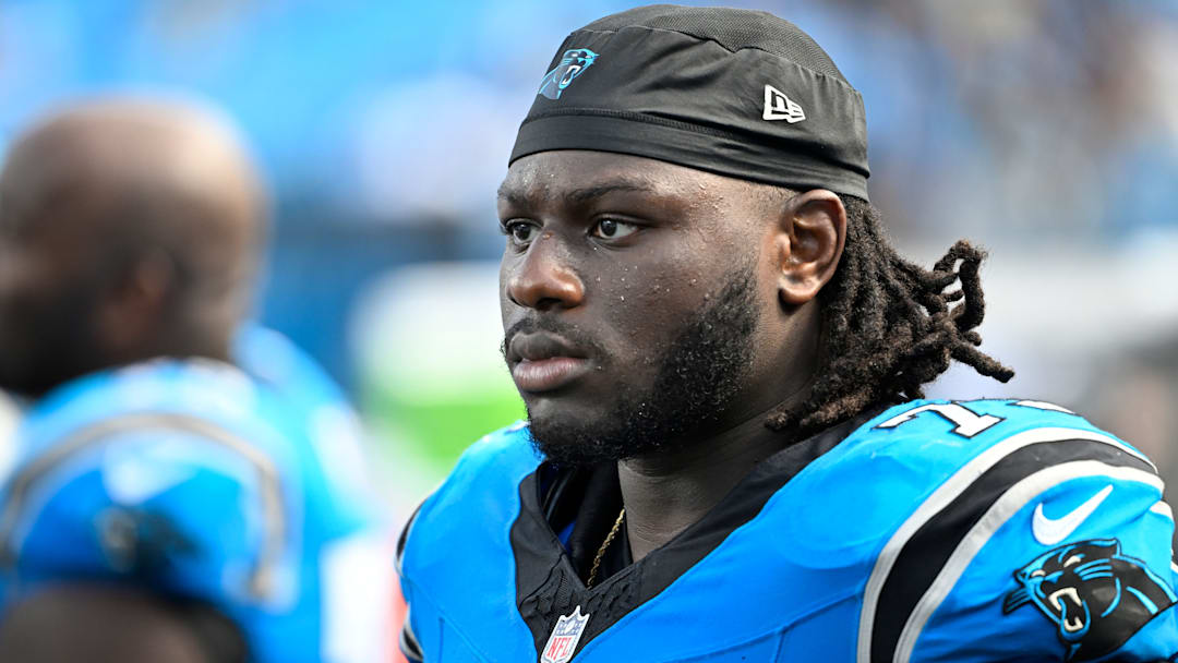 Sep 21, 2025; Charlotte, North Carolina, USA; Carolina Panthers offensive tackle Ikem Ekwonu (79) on the sidelines in the fourth quarter at Bank of America Stadium. 