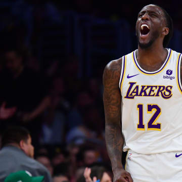 Apr 6, 2024; Los Angeles, California, USA; Los Angeles Lakers forward Taurean Prince (12) reacts after scoring a three point basket against the Cleveland Cavaliers during the first half at Crypto.com Arena.