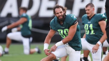 Aug 1, 2024; Philadelphia, PA, USA; Philadelphia Eagles tight end Dallas Goedert (88) stretches during a training camp practice at Lincoln Financial Field. Mandatory Credit: Bill Streicher-USA TODAY Sports