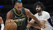 Minnesota Timberwolves center Rudy Gobert works past Orlando Magic center Goga Bitadze at Target Center in Minneapolis on March 14, 2025.
