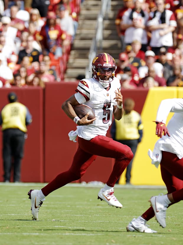 Washington Commanders quarterback Jayden Daniels (5).