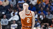 Texas Longhorns guard Chendall Weaver (2) reacts after a made three point basket  against the Tennessee Volunteers during the second half at Bridgestone Arena.