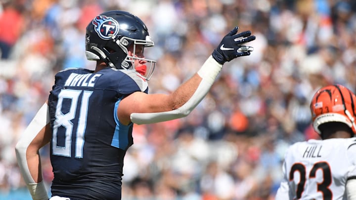 Oct 1, 2023; Nashville, Tennessee, USA; Tennessee Titans tight end Josh Whyle (81) celebrates after a touchdown during the first half against the Cincinnati Bengals at Nissan Stadium. Mandatory Credit: Christopher Hanewinckel-Imagn Images