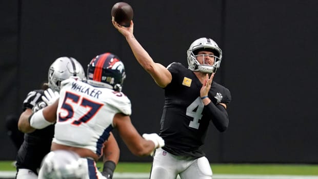 Nov 15, 2020; Raiders quarterback Derek Carr (4) throws a pass against the Denver Broncos