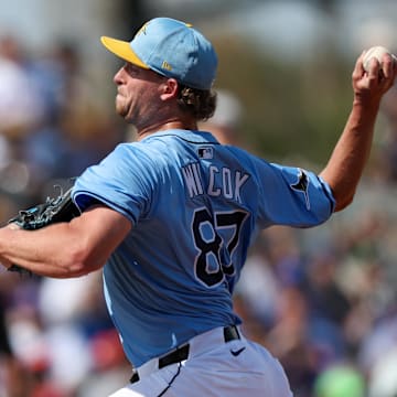 Mar 1, 2025; Port Charlotte, Florida, USA; Tampa Bay Rays pitcher Cole Wilcox (87) throws a pitch against the New York Mets in the fifth inning during spring training at Charlotte Sports Park. Mandatory Credit: Nathan Ray Seebeck-Imagn Images