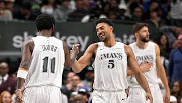 Nov 27, 2024; Dallas, Texas, USA; Dallas Mavericks guard Spencer Dinwiddie (26) and guard Kyrie Irving (11) and guard Quentin Grimes (5) during the game between the Dallas Mavericks and the New York Knicks at the American Airlines Center. Mandatory Credit: Jerome Miron-Imagn Images