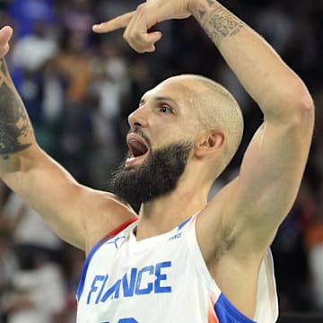 Aug 8, 2024; Paris, France; France shooting guard Evan Fournier (10) /celebrates after the game against Germany in a men's basketball semifinal game during the Paris 2024 Olympic Summer Games at Accor Arena. Mandatory Credit: Kyle Terada-Imagn Images