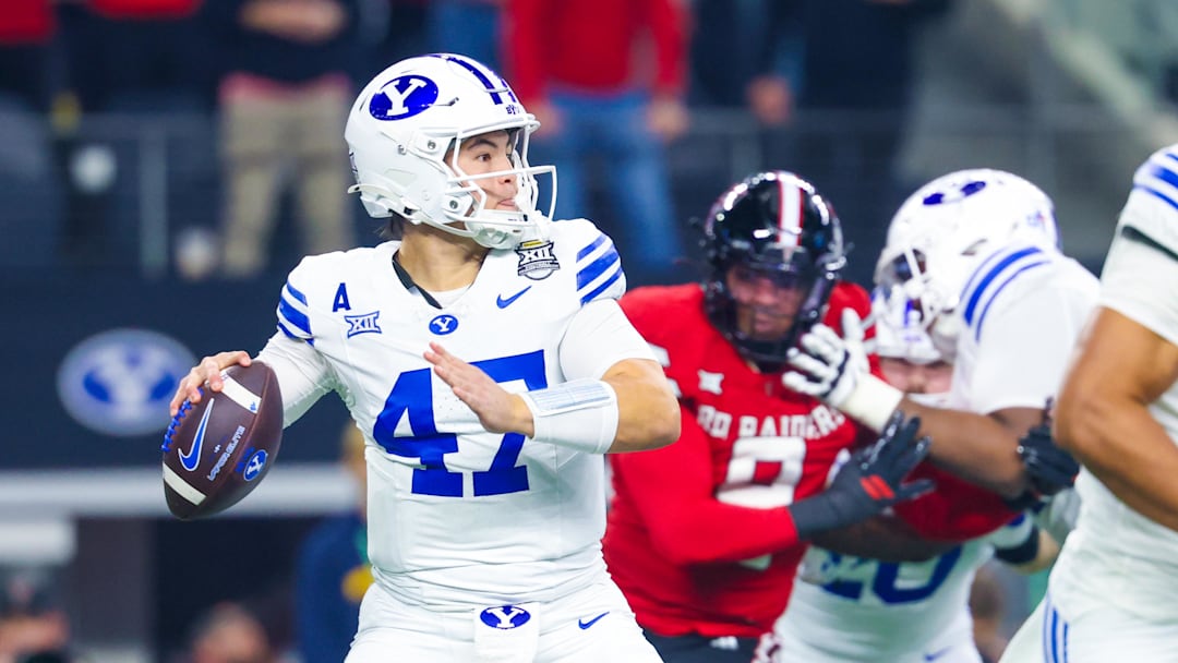 Dec 6, 2025; Arlington, TX, USA;  BYU Cougars quarterback Bear Bachmeier (47) throws during the first quarter against the Texas Tech Red Raiders at AT&T Stadium. Mandatory Credit: Kevin Jairaj-Imagn Images