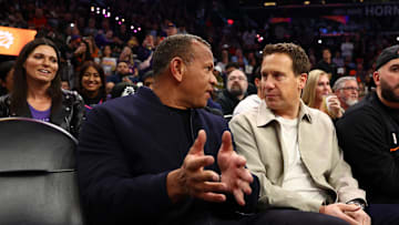 Jan 29, 2025; Phoenix, Arizona, USA; Phoenix Suns owner Mat Ishbia (right) talks with Alex Rodriguez (left) before the game between the Phoenix Suns and Minnesota Timberwolves at Footprint Center. Mandatory Credit: Mark J. Rebilas-Imagn Images