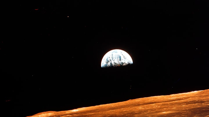 View of Earth from Apollo 10 orbiting the Moon, 1969.