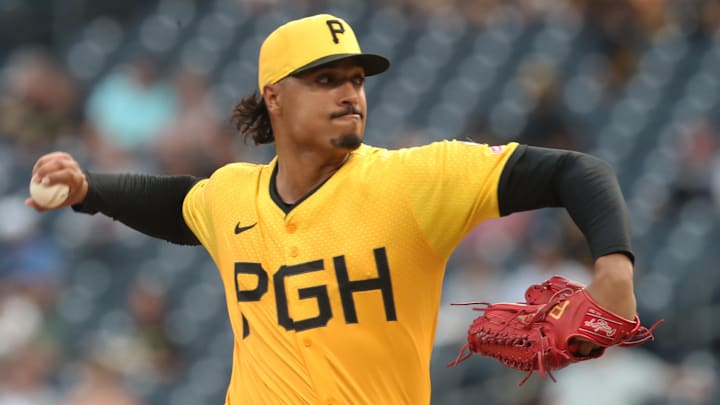 Sep 5, 2025; Pittsburgh, Pennsylvania, USA;  Pittsburgh Pirates staring pitcher Johan Oviedo (24) delivers a pitch against the Milwaukee Brewers during the first inning at PNC Park. Mandatory Credit: Charles LeClaire-Imagn Images