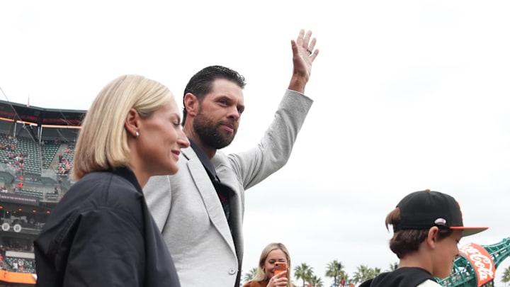 Apr 25, 2026; San Francisco, California, USA; San Francisco Giants former first baseman Brandon Belt (center) waves during a ceremony before the game against the Miami Marlins at Oracle Park. Mandatory Credit: Darren Yamashita-Imagn Images