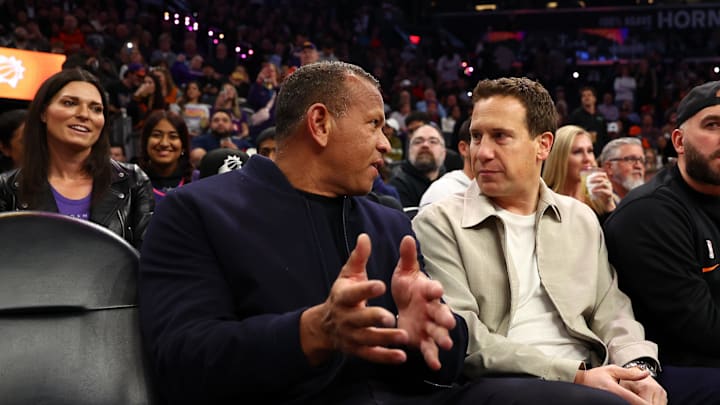 Jan 29, 2025; Phoenix, Arizona, USA; Phoenix Suns owner Mat Ishbia (right) talks with Alex Rodriguez (left) before the game between the Phoenix Suns and Minnesota Timberwolves at Footprint Center. Mandatory Credit: Mark J. Rebilas-Imagn Images