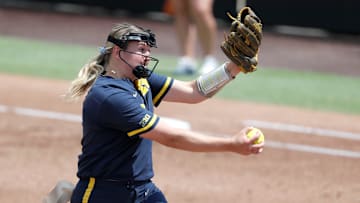 Michigan's Lauren Derkowski (18) pitches during a softball game against Kentucky in the first round of the Stillwater Regional of the NCAA Tournament in Stillwater, Okla., Friday, May 17, 2024.