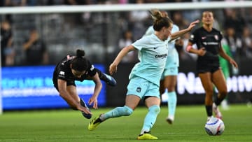 Jul 6, 2024; Los Angeles, California, USA; NJ/NY Gotham FC midfielder Emily Sonnett (6) steals the ball from Angel City FC midfielder Rocky Rodriguez (7) during the first half at BMO Stadium. Mandatory Credit: Kelvin Kuo-USA TODAY Sports