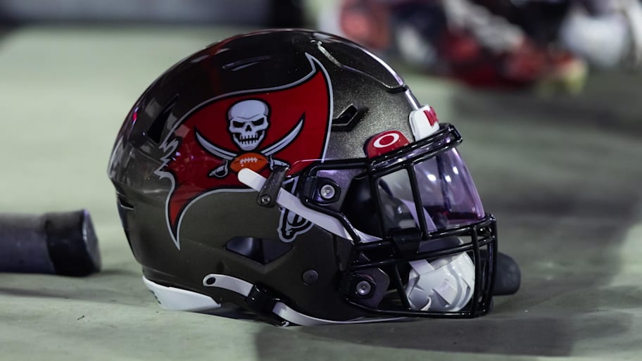 Detailed view of a Tampa Bay Buccaneers helmet at State Farm Stadium. | Mark J. Rebilas-Imagn Images