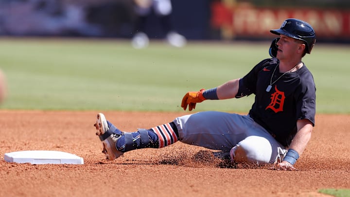 Feb 23, 2025; Tampa, Florida, USA; Detroit Tigers third base Jace Jung (17) slides into second base on a double against the New York Yankees in the fourth inning during spring training at George M. Steinbrenner Field. Feb 23, 2025; Tampa, Florida, USA; Detroit Tigers third base Jace Jung (17) slides into second base on a double against the New York Yankees in the fourth inning during spring training at George M. Steinbrenner Field.