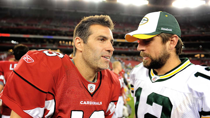 Aug. 28, 2009; Glendale, AZ, USA; Arizona Cardinals quarterback (13) Kurt Warner greets Green Bay Packers quarterback (12) Aaron Rodgers following a preseason game at University of Phoenix Stadium. Mandatory Credit: Mark J. Rebilas-USA TODAY Sports Aug. 28, 2009; Glendale, AZ, USA; Arizona Cardinals quarterback (13) Kurt Warner greets Green Bay Packers quarterback (12) Aaron Rodgers following a preseason game at University of Phoenix Stadium. Mandatory Credit: Mark J. Rebilas-USA TODAY Sports