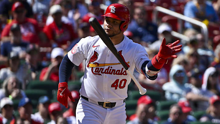 Aug 22, 2024; St. Louis, Missouri, USA;  St. Louis Cardinals catcher Willson Contreras (40) tosses his bat after drawing a walk with the bases loaded against the Milwaukee Brewers during the seventh inning at Busch Stadium. Mandatory Credit: Jeff Curry-Imagn Images