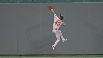 Aug 5, 2024; Kansas City, Missouri, USA;  Boston Red Sox center fielder Ceddanne Rafaela (43) catches a fly ball in front of the center field wall against Kansas City Royals Maikel Garcia (not pictured) in the fifth inning at Kauffman Stadium. Mandatory Credit: Peter Aiken-USA TODAY Sports