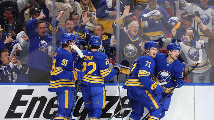 May 6, 2026; Buffalo, New York, USA; Buffalo Sabres defenseman Bowen Byram (4) celebrates his goal with teammates during the second period against the Montréal Canadiens in game one of the second round of the 2026 Stanley Cup Playoffs at KeyBank Center. Mandatory Credit: Timothy T. Ludwig-Imagn Images