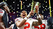 Jan 20, 2025; Atlanta, GA, USA; Ohio State Buckeyes wide receiver Emeka Egbuka (2) celebrates after winning against the Notre Dame Fighting Irish in the CFP National Championship college football game at Mercedes-Benz Stadium.