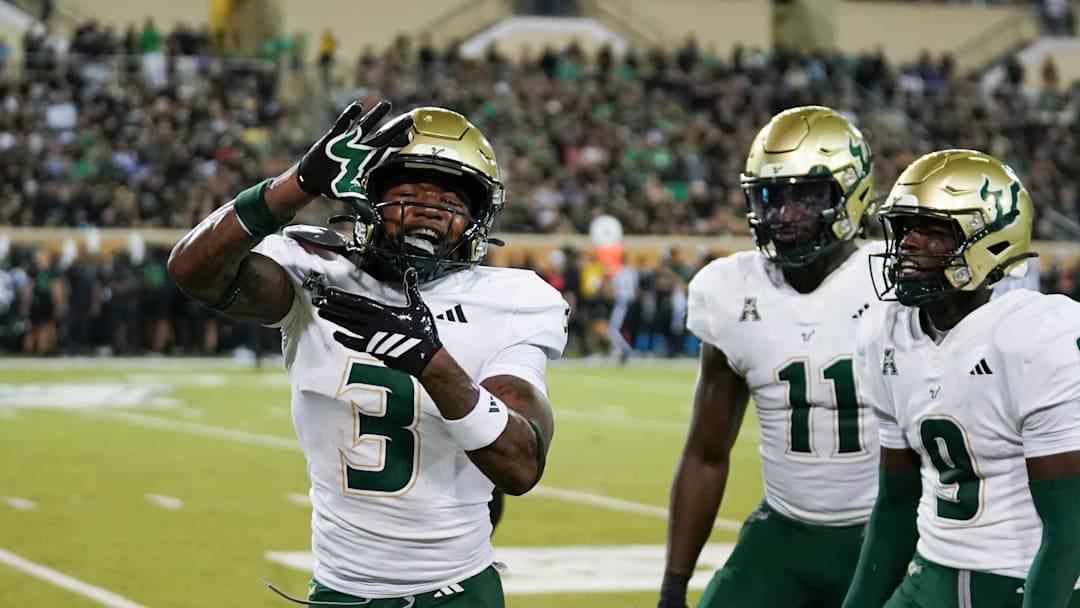 Oct 10, 2025; Denton, Texas, USA; South Florida Bulls cornerback Jonas Duclona (3) reacts after an interception against the North Texas Mean Green during the first half of a game at DATCU Stadium. Mandatory Credit: Raymond Carlin III-Imagn Images Oct 10, 2025; Denton, Texas, USA; South Florida Bulls cornerback Jonas Duclona (3) reacts after an interception against the North Texas Mean Green during the first half of a game at DATCU Stadium. Mandatory Credit: Raymond Carlin III-Imagn Images