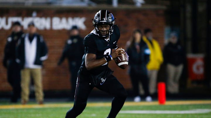 Cardinal Ritter's Carson Boyd (2) looks for a receiver as the Lions took on the Republic Tigers in the Class 5 State Championship football game at Faurot Field in Columbia, Mo. on Friday, Dec. 1, 2023.