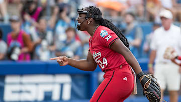 Jun 6, 2025; Oklahoma City, OK, USA;  Texas Tech Red Raiders pitcher NiJaree Canady (24) points to her catcher after a strikeout in the first inning against the Texas Longhorns during game three of the NCAA Softball Women's College World Series finals at Devon Park. Mandatory Credit: Brett Rojo-Imagn Images