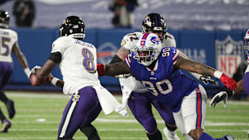 Bills Quinton Jefferson pressures Ravens quarterback Lamar Jackson.