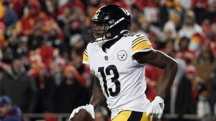 Jan 16, 2022; Kansas City, Missouri, USA; Pittsburgh Steelers wide receiver James Washington (13) returns to the sidelines after scoring against the Kansas City Chiefs in an AFC Wild Card playoff football game at GEHA Field at Arrowhead Stadium. Mandatory Credit: Denny Medley-USA TODAY Sports