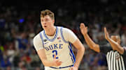 Apr 5, 2025; San Antonio, TX, USA; Duke Blue Devils forward Cooper Flagg (2) reacts after a three point basket against the Houston Cougars during the first half in the semifinals of the men's Final Four of the 2025 NCAA Tournament at the Alamodome. Mandatory Credit: Bob Donnan-Imagn Images